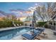 Stunning pool and spa with lounge chairs, offering a relaxing outdoor oasis at 18391 N 97Th Pl, Scottsdale, AZ 85255