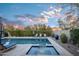 Inviting pool and spa with mountain views and lounge chairs at 18391 N 97Th Pl, Scottsdale, AZ 85255