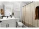 Guest bathroom with shower/tub combo and modern vanity at 20210 N Wagner Wash Dr, Buckeye, AZ 85396