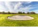 Large sand trap on a manicured golf course at 2422 E Durango Dr, Casa Grande, AZ 85194