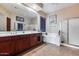 Double vanity bathroom with soaking tub and walk-in shower at 2611 W Trapanotto Rd, Phoenix, AZ 85086