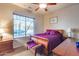 Bright bedroom with a large window and comfortable furnishings at 2611 W Trapanotto Rd, Phoenix, AZ 85086