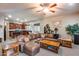 Open concept living room with comfortable seating and views to kitchen at 2611 W Trapanotto Rd, Phoenix, AZ 85086
