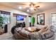 Spacious living room with leather sectional and built-in entertainment center at 2611 W Trapanotto Rd, Phoenix, AZ 85086
