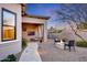 Landscaped backyard with fire pit and seating area at 26475 N 106Th Way, Scottsdale, AZ 85255
