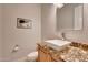 Powder room with modern sink and granite countertop at 26475 N 106Th Way, Scottsdale, AZ 85255
