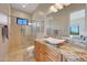 Guest bathroom with walk-in shower and modern vanity at 26475 N 106Th Way, Scottsdale, AZ 85255