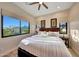 Bright bedroom with mountain views and neutral decor at 26475 N 106Th Way, Scottsdale, AZ 85255