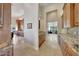 Butlers pantry with granite counters and ample storage space at 26475 N 106Th Way, Scottsdale, AZ 85255