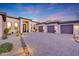 Three-car garage and inviting entryway at 26475 N 106Th Way, Scottsdale, AZ 85255