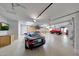 Spacious garage with car lift and storage at 26475 N 106Th Way, Scottsdale, AZ 85255