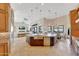 Open kitchen with large island, breakfast bar, and Gathering room access at 26475 N 106Th Way, Scottsdale, AZ 85255