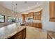 Spacious kitchen featuring granite counters, stainless steel appliances, and ample cabinetry at 26475 N 106Th Way, Scottsdale, AZ 85255