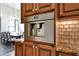 Built-in coffee maker in the kitchen with granite countertops at 26475 N 106Th Way, Scottsdale, AZ 85255