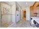 Bright laundry room with white subway tile and a shower at 26475 N 106Th Way, Scottsdale, AZ 85255