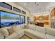 Open floor plan with kitchen and pool views from living room at 26475 N 106Th Way, Scottsdale, AZ 85255