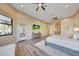 Main bedroom with sitting area and access to private patio at 26475 N 106Th Way, Scottsdale, AZ 85255