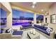 Spacious covered patio with comfortable seating and a view of the pool at 26475 N 106Th Way, Scottsdale, AZ 85255