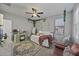 Charming bedroom with a bed, vanity, and hanging chair at 3022 W Trapanotto Rd, Phoenix, AZ 85086