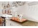 Wet bar with copper tray, glassware, and ample storage at 3172 S Mulberry Ct, Gold Canyon, AZ 85118
