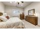 Spacious bedroom with ensuite bathroom and wooden furniture at 3172 S Mulberry Ct, Gold Canyon, AZ 85118