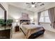 Comfortable bedroom with a queen-size bed and built-in dresser at 3172 S Mulberry Ct, Gold Canyon, AZ 85118