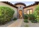 Brick arch entryway with a stone path leading to the front door at 3172 S Mulberry Ct, Gold Canyon, AZ 85118