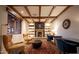 Cozy library with a fireplace, built-in bookshelves, and comfortable seating at 3172 S Mulberry Ct, Gold Canyon, AZ 85118