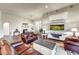 Open floor plan living area with adjacent dining and kitchen at 3172 S Mulberry Ct, Gold Canyon, AZ 85118