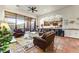 Open concept living area with a view into the kitchen and bar area at 3172 S Mulberry Ct, Gold Canyon, AZ 85118