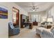 Home office with built-in shelving, comfortable seating, and large desk at 3172 S Mulberry Ct, Gold Canyon, AZ 85118