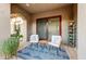 Relaxing patio with comfortable seating and potted plants at 3172 S Mulberry Ct, Gold Canyon, AZ 85118