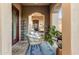 Private patio with comfortable seating and blue rug at 3172 S Mulberry Ct, Gold Canyon, AZ 85118