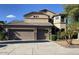 Two-story house with three-car garage and desert landscaping at 3502 W Belle Ave, San Tan Valley, AZ 85144