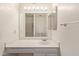 Bathroom with vanity, mirror, and shower at 3801 W Mercer Ln, Phoenix, AZ 85029