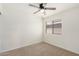 Bright bedroom with ceiling fan and neutral carpeting at 4007 E Agave Rd, Phoenix, AZ 85044