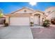 One-story house with a two-car garage and well-maintained landscaping at 4007 E Agave Rd, Phoenix, AZ 85044