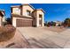 Two-story house with driveway and walkway at 4338 E Woodridge Dr, Phoenix, AZ 85032