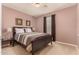 Cozy bedroom with a double bed and nightstand at 45707 W Barbara Ln, Maricopa, AZ 85139