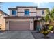 Two story home with attached garage and landscaping at 45707 W Barbara Ln, Maricopa, AZ 85139