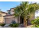 Two story home with attached garage and landscaping at 45707 W Barbara Ln, Maricopa, AZ 85139