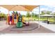 playground with shade structure and playset at 45707 W Barbara Ln, Maricopa, AZ 85139