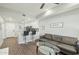 Open-concept living space seamlessly connects a cozy seating area to a functional kitchen at 475 N 9Th St # 115, Phoenix, AZ 85006
