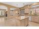 Large kitchen with island, granite countertops, and light wood cabinets at 4840 E Dale Ln, Cave Creek, AZ 85331