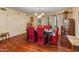 Bright dining room features hardwood floors and a charming chandelier at 5131 N 18Th St, Phoenix, AZ 85016