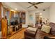 Living Room with leather couch and large TV at 5131 N 18Th St, Phoenix, AZ 85016