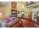 Bright living room featuring hardwood floors and a cozy fireplace at 5131 N 18Th St, Phoenix, AZ 85016