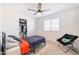 Cozy bedroom with a twin bed, window coverings, and a closet at 5323 W Chuck Box Rd, Laveen, AZ 85339