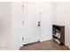 Entryway with shoe storage and wood-look flooring at 5323 W Chuck Box Rd, Laveen, AZ 85339