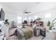 Spacious Gathering room featuring a comfortable sectional sofa and built-in shelving at 5323 W Chuck Box Rd, Laveen, AZ 85339